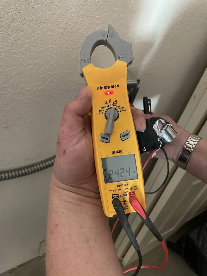 Voltage testing with clamp meter during Aluminum Wiring Replacement in Van Buren